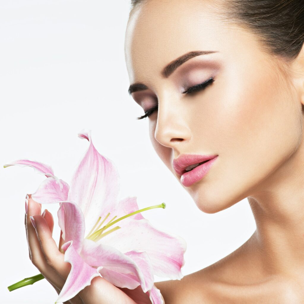 Beautiful Woman Smells Flower Skin Care Beauty